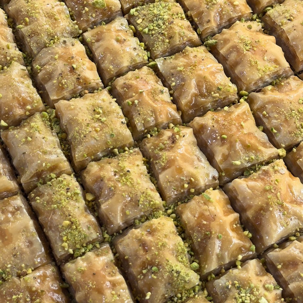 Trays of pistachio baklava made by Watan Delights